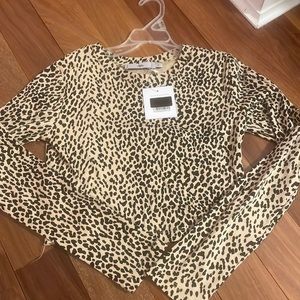 Adika long sleeve cheetah top size S NWT